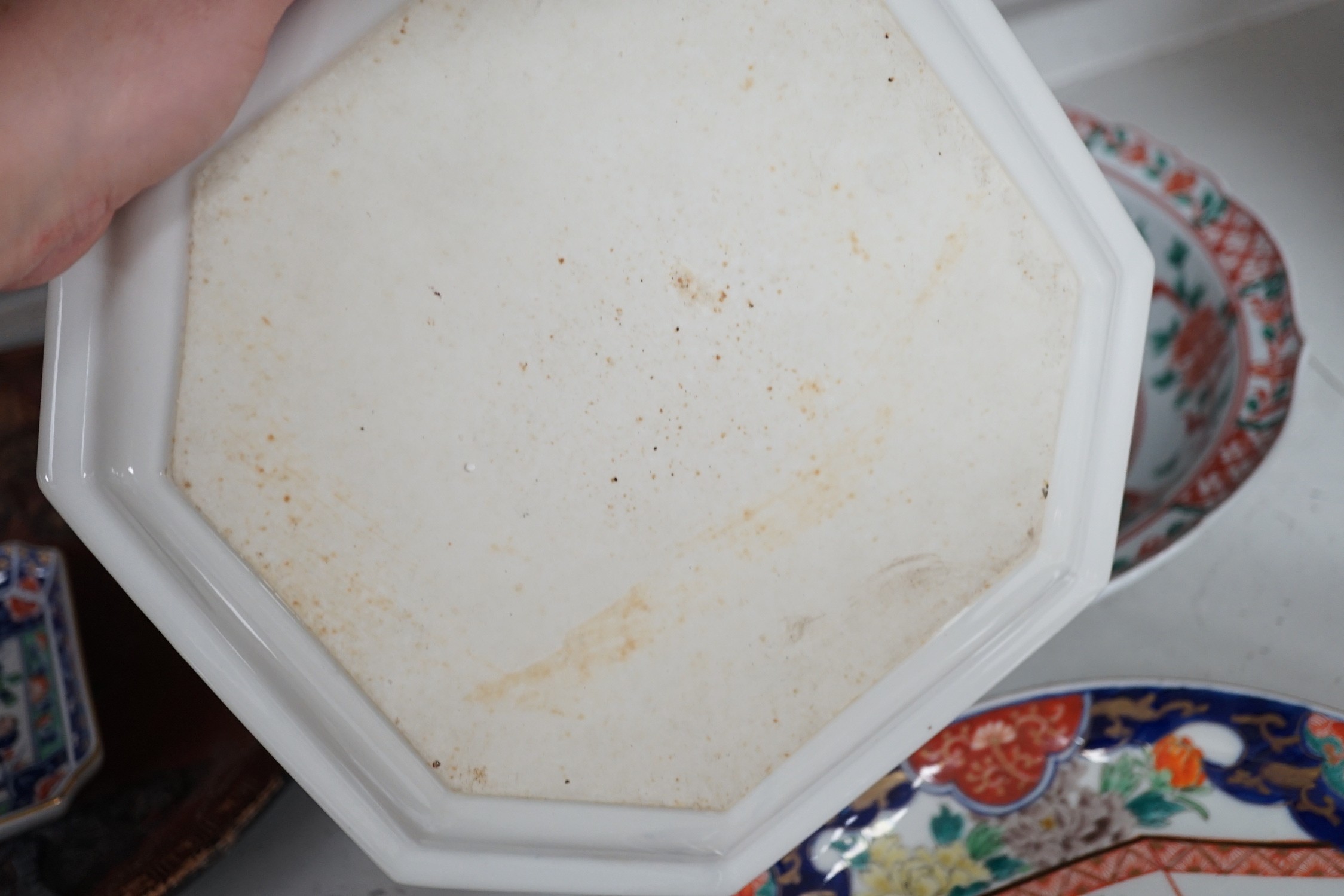 A group of 19th/20th century Japanese porcelain and pottery dishes. Largest 33cm diameter